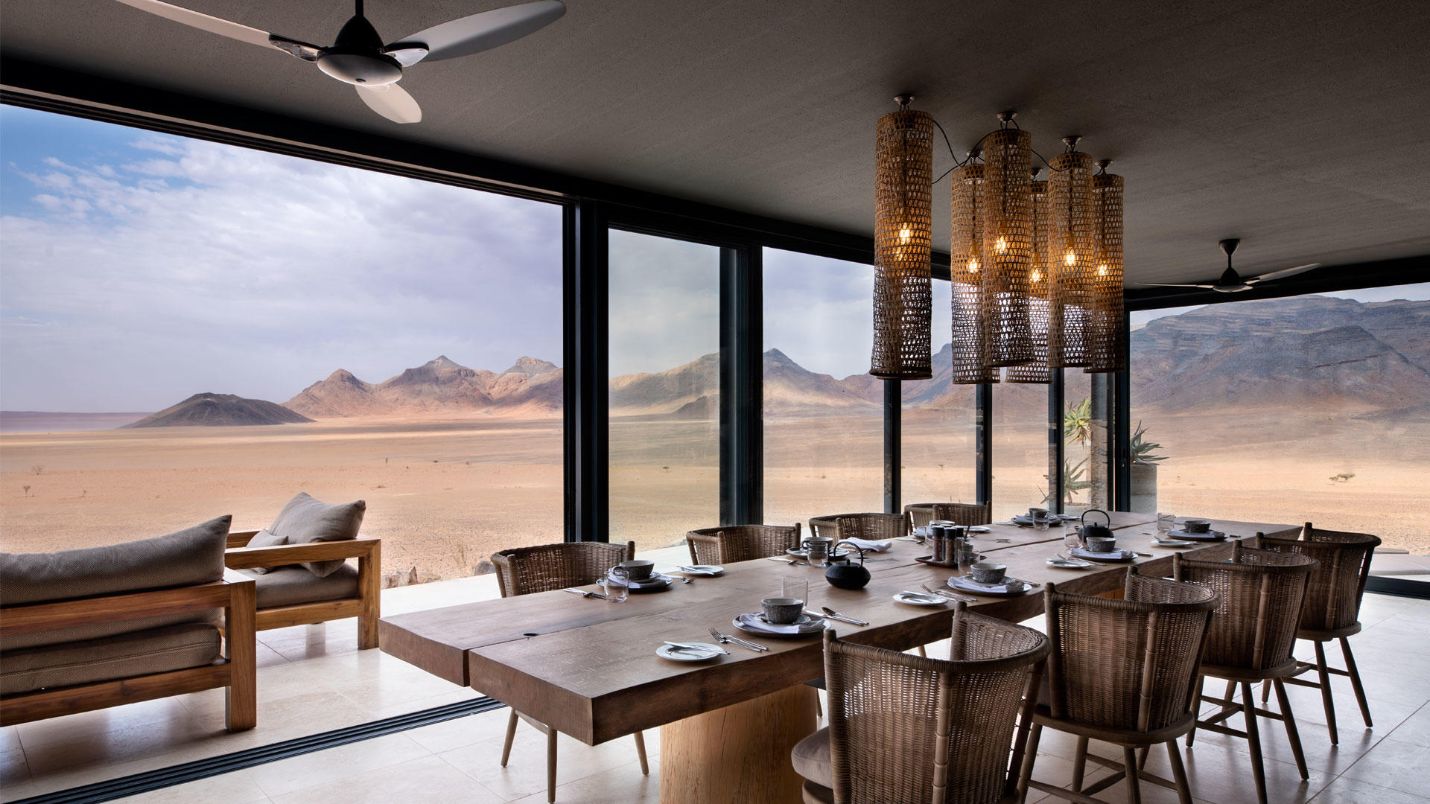 Lodge dining area with panoramic desert views in Namibia