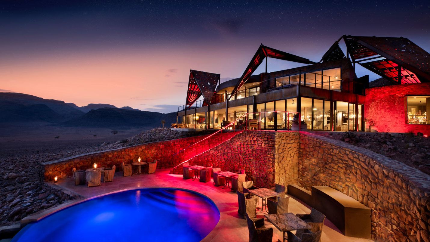 Namibian lodge at sunset with dramatic lighting